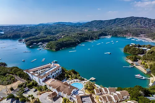 A resort hotel overlooking the pearly sea of Ago Bay