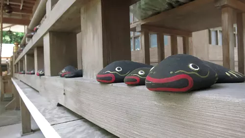 Catfish on the railing of Omura Shrine